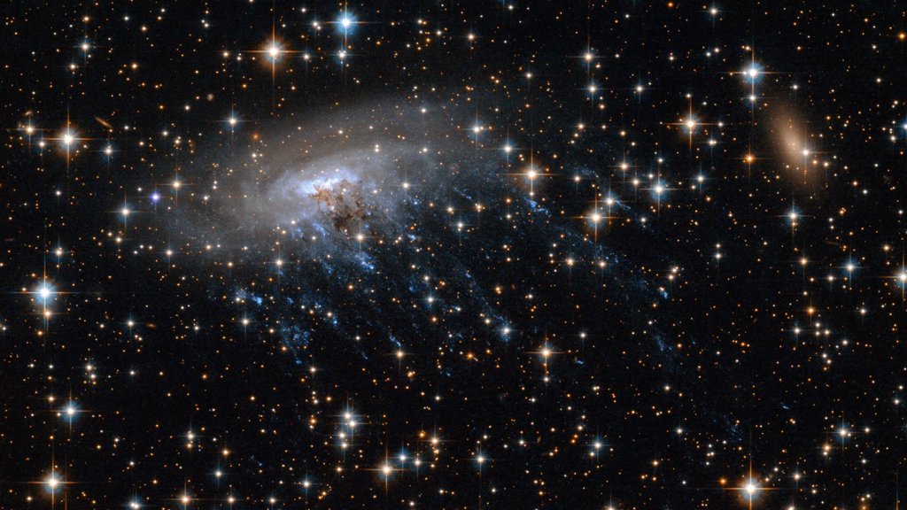 James Webb spots a galaxy with tentacles in deep space | ScienceDaily