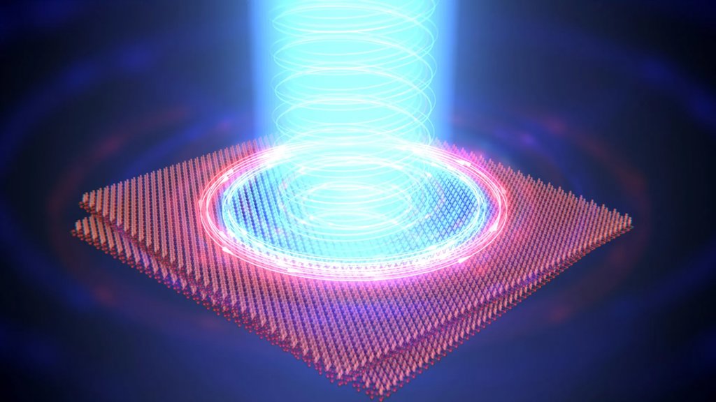 A flash of laser light flips a magnet in major light-control breakthrough | ScienceDaily