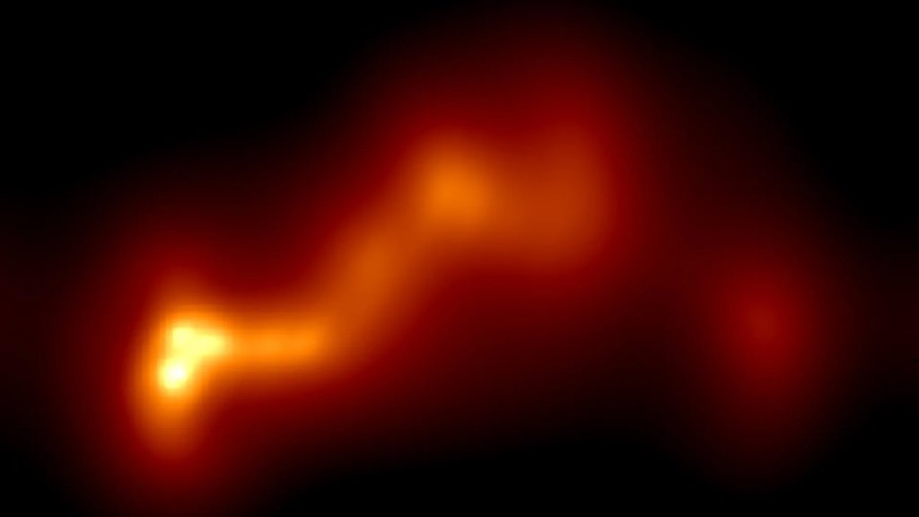 A telescope larger than Earth just revealed the hidden heart of a mysterious galaxy | ScienceDaily